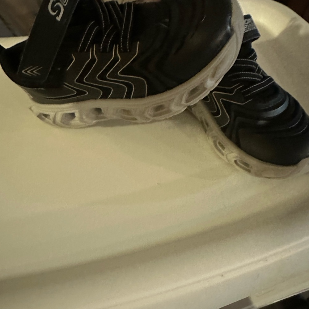 Skechers Black and White Sneakers with Cushioned Sole